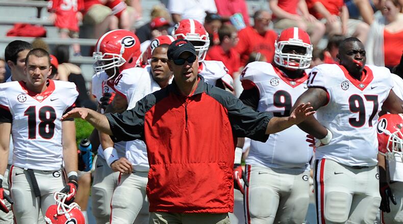 New defensive coordinator Jeremy Pruitt signals in calls during Georgia's G-Day Game Saturday, April 12, 2014, at Stanford Stadium in Athens.
