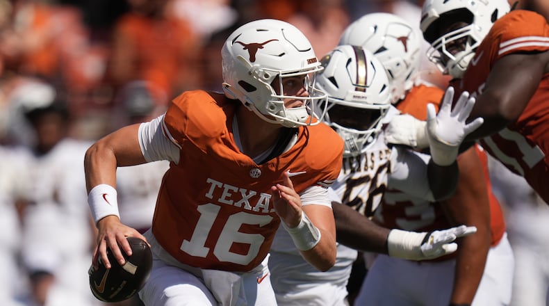 Texas quarterback Arch Manning (16) scrambles against Texas State during the first half of an NCAA college football game in Austin, Texas, Saturday, Sept. 5, 2026. (AP Photo/Eric Gay)