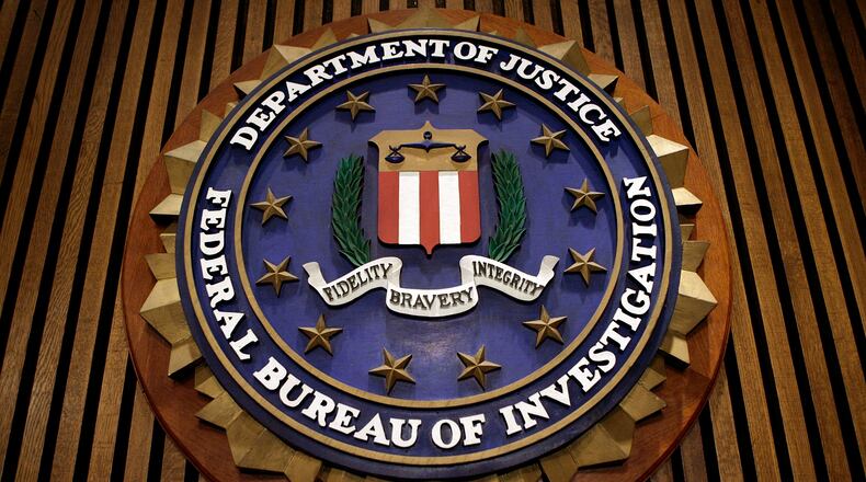 The seal of the FBI hangs in the Flag Room at the bureau's headquaters in Washington, DC.
