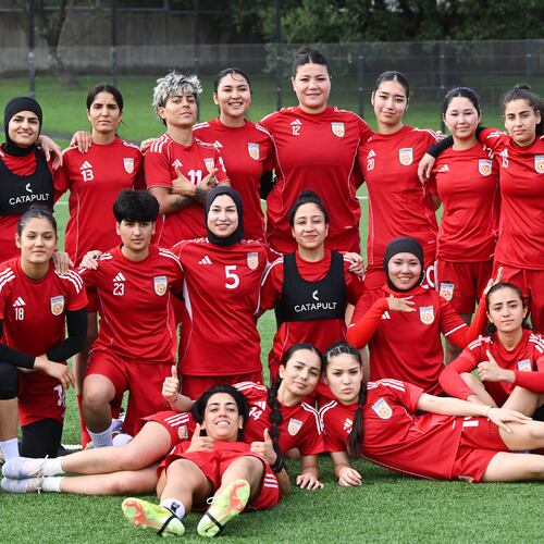 Afghan women's players pose for a team photo during a training session in Auckland, New Zealand, Tuesday, June 2, 2026. (Andrew Cornaga/Photosport via AP)