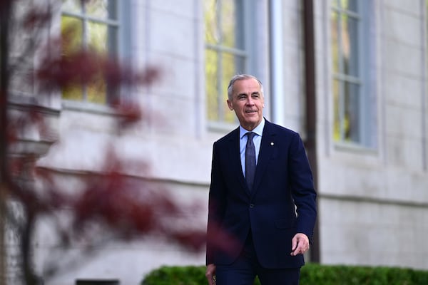 Canadian Prime Minister Mark Carney, arrives for the cabinet swearing-in ceremony at Rideau Hall in Ottawa, Tuesday, May 13, 2025. (Spencer Colby/The Canadian Press via AP)