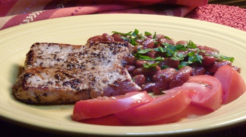 Cracked Pepper Pork with Honey Mustard Baked Beans. (Linda Gassenheimer/TNS)