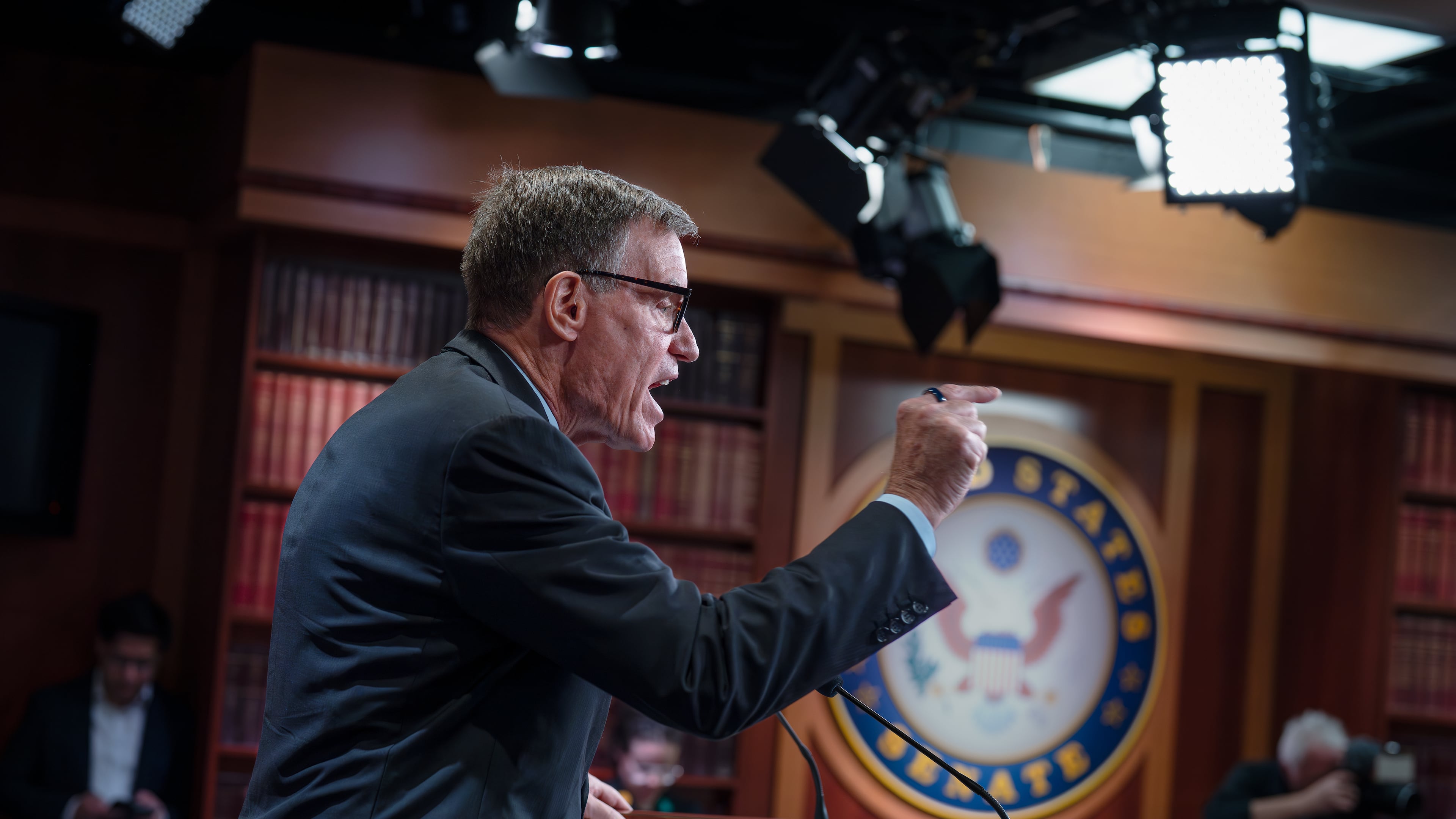 Sen. Mark Warner, D-Va., the top Democrat on the Senate Intelligence Committee, speaks about the Trump administration following reports that only Republican lawmakers received security briefings on the Trump-ordered military strikes against boats in the Caribbean, during a news conference at the Capitol in Washington, Thursday, Oct. 30, 2025. (AP Photo/J. Scott Applewhite)