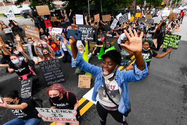 Tiffany Swaby, protests in front of city hall on Friday, June 5,  in Atlanta. JOHN AMIS  for The Atlanta Journal-Constitution