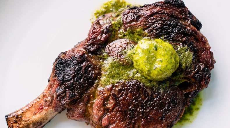 The bone-in rib-eye with shiso herb butter at Noona Steakhouse & Oyster Bar in Duluth. The Asian steak sauces and butters at Noona make the steaks memorable. CONTRIBUTED BY HENRI HOLLIS
