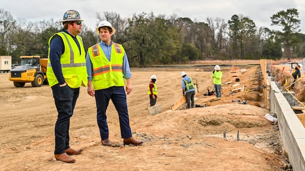 U.S House candidate Jim Kingston (second from left), gets a tour of an automotive construction site in Savannah on Jan. 7, 2026. (Sarah Peacock for the AJC)