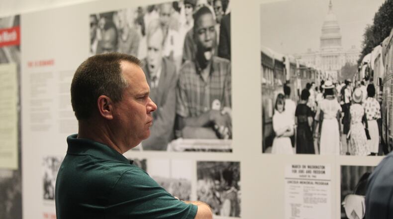 February 14, 2017, Atlanta, Georgia - Gwinnett County Commissioner Tommy Hunter walks through the civil rights exhibit at the National Center for Civil and Human Rights in Atlanta, Georgia, on Tuesday, February 14, 2017. (HENRY TAYLOR / HENRY.TAYLOR@AJC.COM)