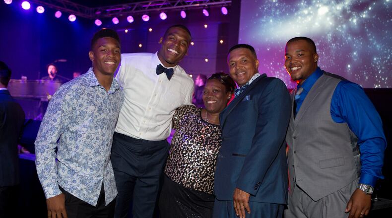 The Newton family - Caylin, Cam, Jackie, Cecil Sr. and Cecil Jr. - at the Cam Newton Foundation Kids Rock Gala. Photo: Kim Hummel/Cam Newton Foundation