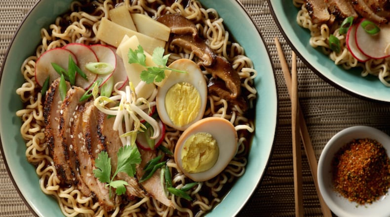 Grilled shichimi togarashi-flavored chicken and soy-wasabi hard-cooked eggs bolster homemade ramen. (Michael Tercha/Chicago Tribune/TNS)