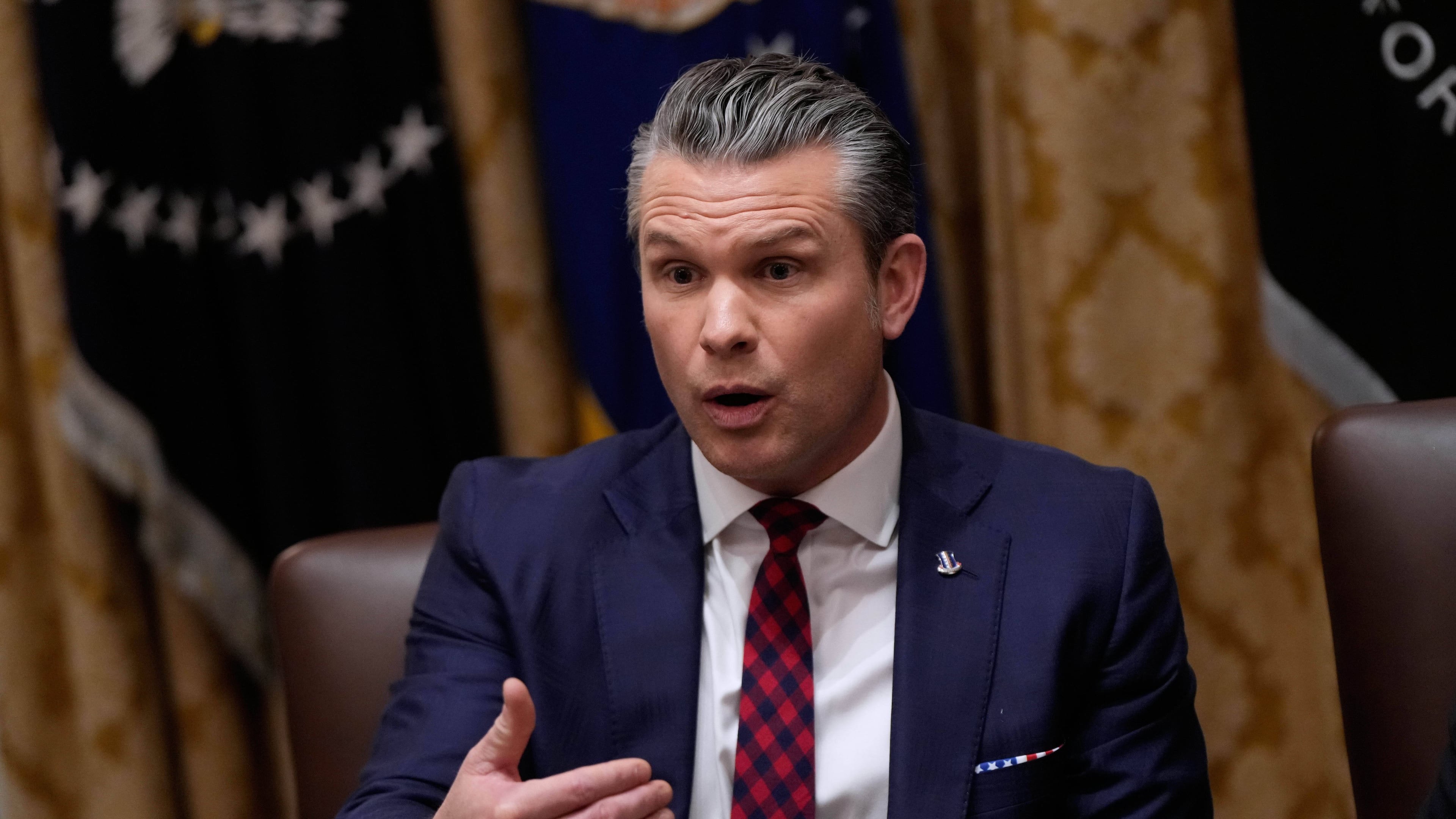 Defense Secretary Pete Hegseth speaks during a Cabinet meeting at the White House, Tuesday, Dec. 2, 2025, in Washington. (AP Photo/Julia Demaree Nikhinson)