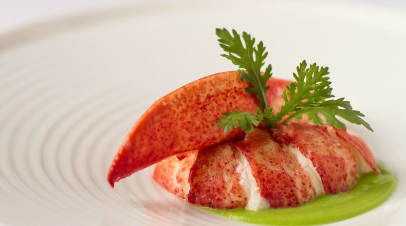 Butter-braised lobster is one of the greatest hits at Aria in Buckhead Credit: George Sanchez