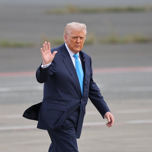 U.S. President Donald Trump walks towards Air Force One at Haneda Airport in Tokyo for his departure to South Korea, Wednesday, Oct. 29, 2025. (Kim Kyung-Hoon/Pool Photo via AP)