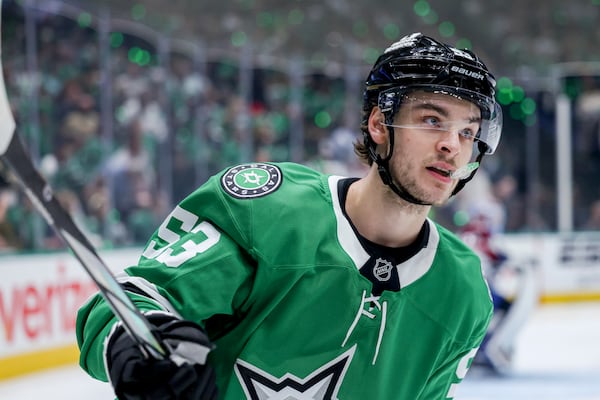 Dallas Stars center Wyatt Johnston skates after scoring during the first period of Game 5 of a first-round NHL hockey playoff series against the Colorado Avalanche in Dallas, Monday, April 28, 2025. (AP Photo/Gareth Patterson)