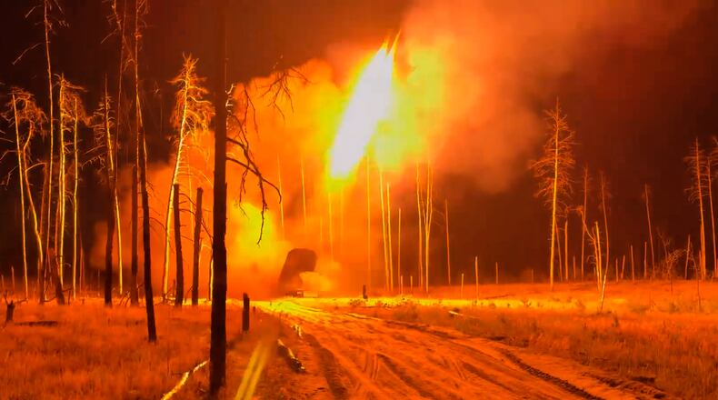 In this image made from video provided by Russian Defense Ministry Press Service on Tuesday, June 30, 2026, Russian TOS-1 Solntsepyok heavy flamethrower rocket launcher fires towards the Ukrainian positions. (Russian Defense Ministry Press Service via AP)