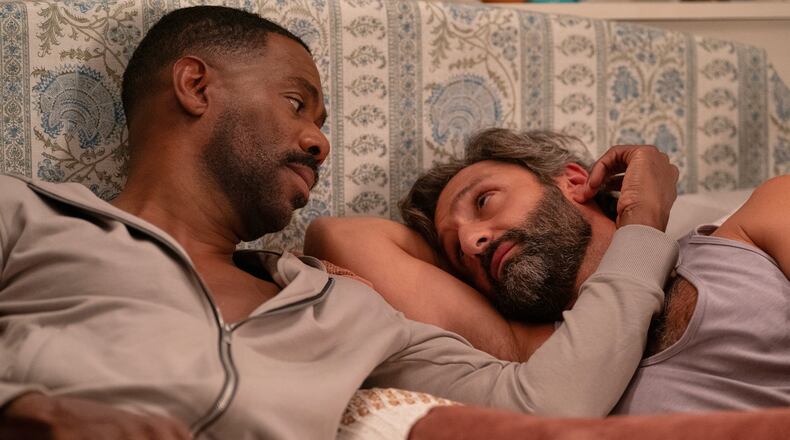This image released by Netflix shows Colman Domingo, left, and Marco Calvani in a scene from "The Four Seasons." (Jon Pack/Netflix via AP)
