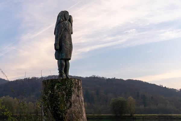 FILE -A bronze sculpture representing Melania Trump stands on a bank of the Sava river in the village of Rozno, near her hometown of Sevnica, Slovenia, Nov. 6, 2024. (AP Photo/Darko Bandic, File)