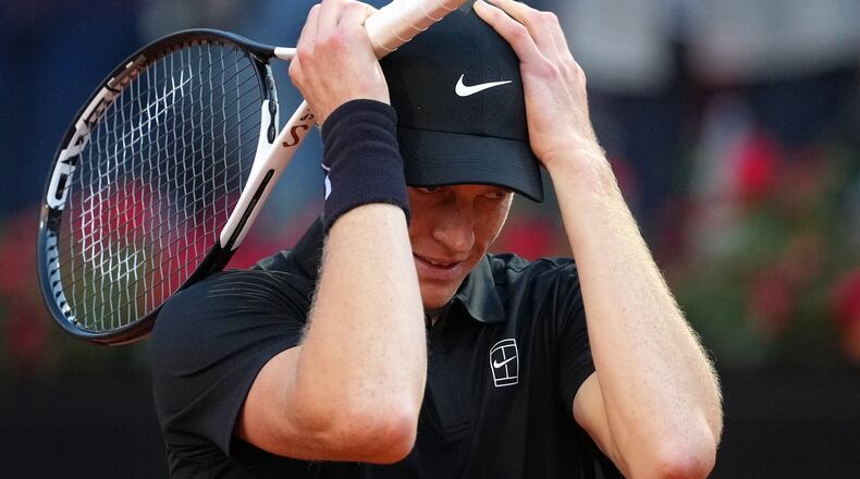 Jannik Sinner, of Italy, reacts after defeating Casper Ruud, of Norway, 6/4, 6/4 in the final match at the Italian Open tennis tournament, in Rome, Sunday, May 17, 2026. (AP Photo/Andrew Medichini)