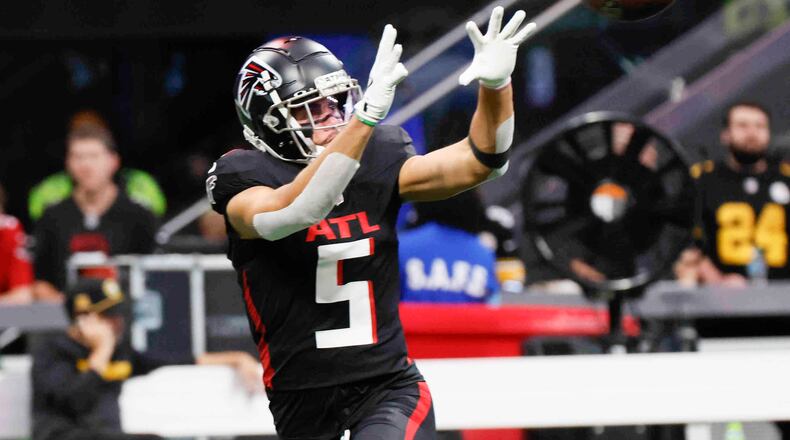 Atlanta Falcons wide receiver Drake London (5) catches the ball during warm-ups before the Falcons face the Pittsburgh Steelers on Sunday, Sept. 8, at Mercedes-Benz Stadium in Atlanta. 
(Miguel Martinez/ AJC)