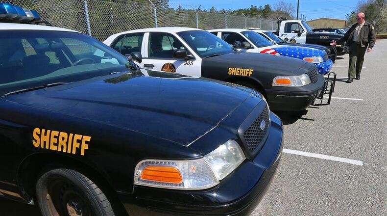 Georgia law enforcement agencies haves used seized assets to pay for patrol cars, computers and other equipment. AJC file photo: CURTIS COMPTON / CCOMPTON@AJC.COM