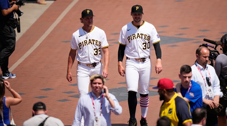 Pittsburgh Pirates' Braxton Ashcraft, left, and Paul Skenes arrive to speak with the media during the MLB baseball All-Star Week, Monday, July 13, 2026, in Philadelphia. (AP Photo/Matt Slocum)