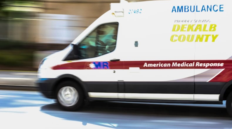 An AMR ambulance leaves Grady Memorial Hospital earlier this year. JOHN SPINK/JSPINK@AJC.COM