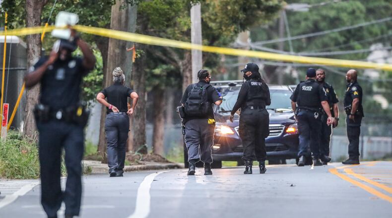 August 30, 2021 Atlanta: Atlanta police investigate the scene on Marietta Street where a man was rushed to a hospital Monday morning, Aug. 30, 2021 after he was forced from his car at gunpoint and shot in downtown Atlanta, police said. The shooting was reported about 5:30 a.m. in the 500 block of Marietta Street, according to Atlanta police. Authorities shut down the road south of North Avenue for several hours Monday while they investigated. “The preliminary investigation found that the victim and an adult female were in a vehicle and stopped at the location,” police spokesman Officer Steve Avery said in an emailed statement. “While stopped, two suspects approached and carjacked the couple.” At some point during the theft, the man was shot, Avery said. One of the suspects got into the couple’s car and drove away, and the other ran off, he said. They had not been identified Monday. The victim was taken to a hospital in serious condition. A description of his vehicle was not provided. The shooting remains under investigation, and anyone with information is asked to come forward. Tipsters can remain anonymous, and be eligible for rewards of up to $2,000, by contacting Crime Stoppers Atlanta at 404-577-8477, texting information to 274637 or visiting the Crime Stoppers website. (John Spink / John.Spink@ajc.com)