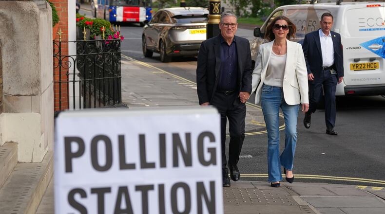 Britain's Prime Minister Keir Starmer and wife Victoria arrive at a polling station in central London, Thursday, May 7, 2026 to cast their votes in the local elections.(AP Photo/Kirsty Wigglesworth)