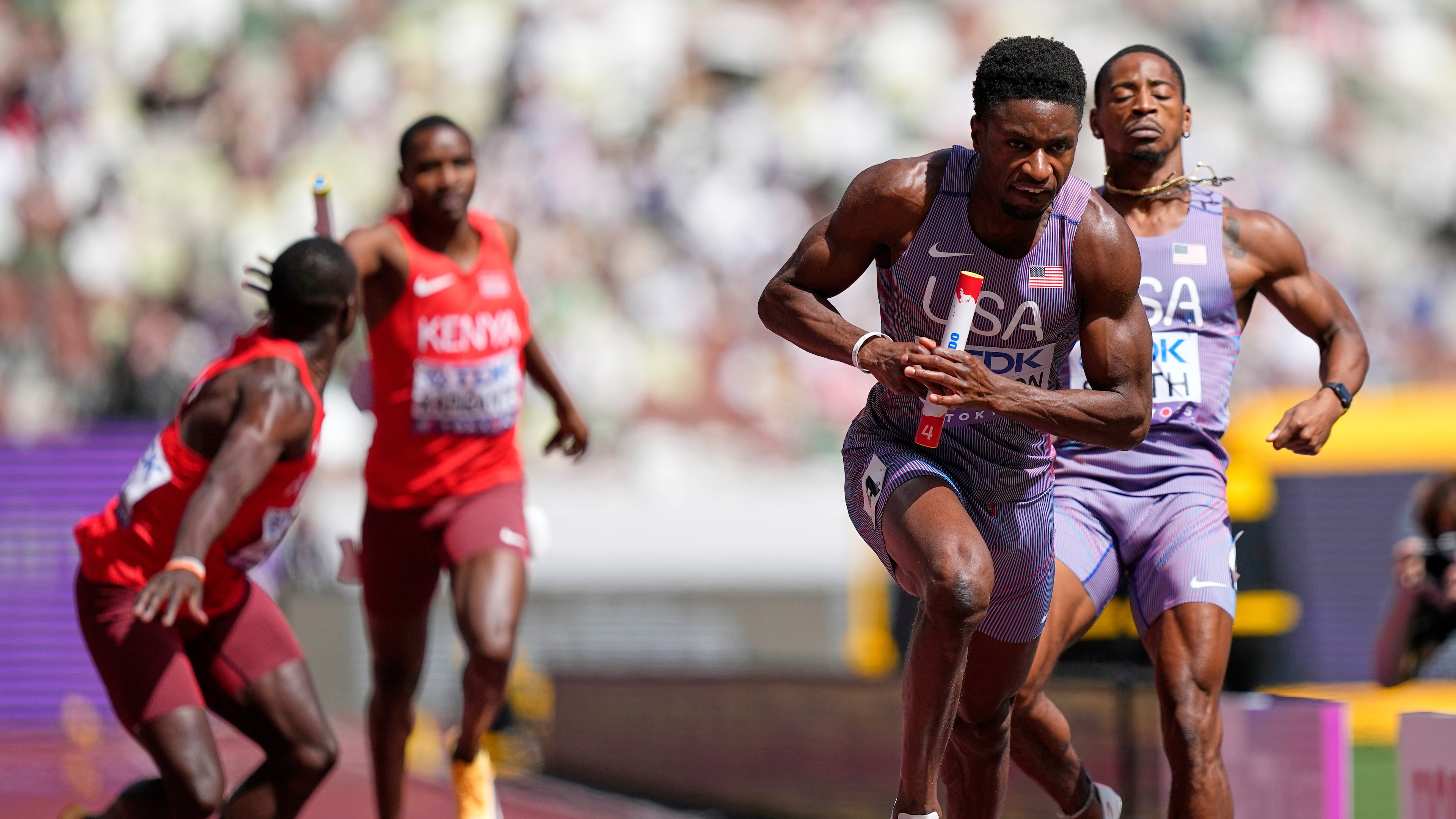 United States' Bryce Deadmon starts his leg in a run-off heat against Kenya in the men's 4x400 meters relay at the World Athletics Championships in Tokyo, Sunday, Sept. 21, 2025. (AP Photo/Petr David Josek)