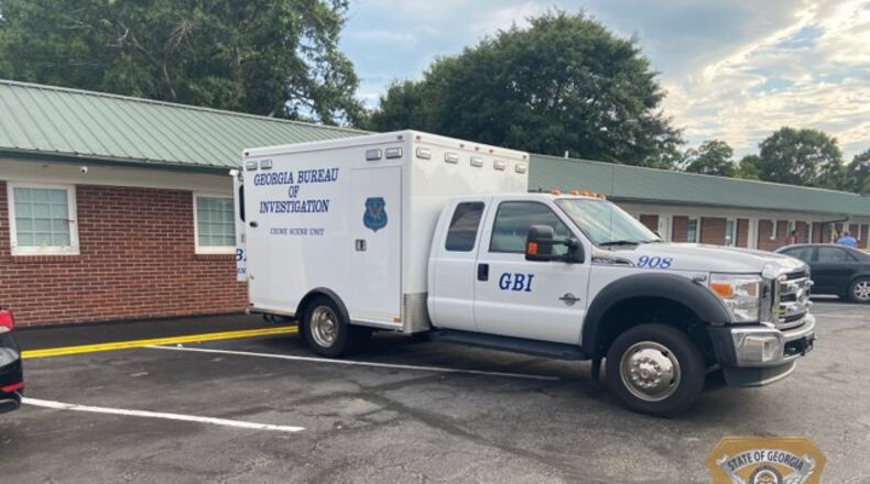 Officers responded to the Regency Inn after getting reports of a person shot there Tuesday, the GBI said.