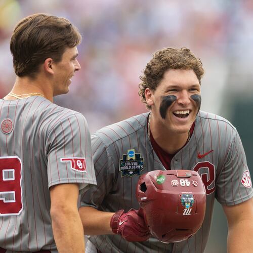 Oklahoma's Deiten Lachance, right, celebrates with Camden Johnson after hitting a two-run home run against North Carolina in the first inning of Game 1 of the NCAA College World Series baseball finals in Omaha, Neb., Saturday, June 20, 2026. (AP Photo/Rebecca S. Gratz)