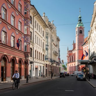 Ljubljana, the capital of Slovenia, offers a picturesque setting for walking tours or bike rides and is an international model for sustainability. (Susan Wright/The New York Times 2024)