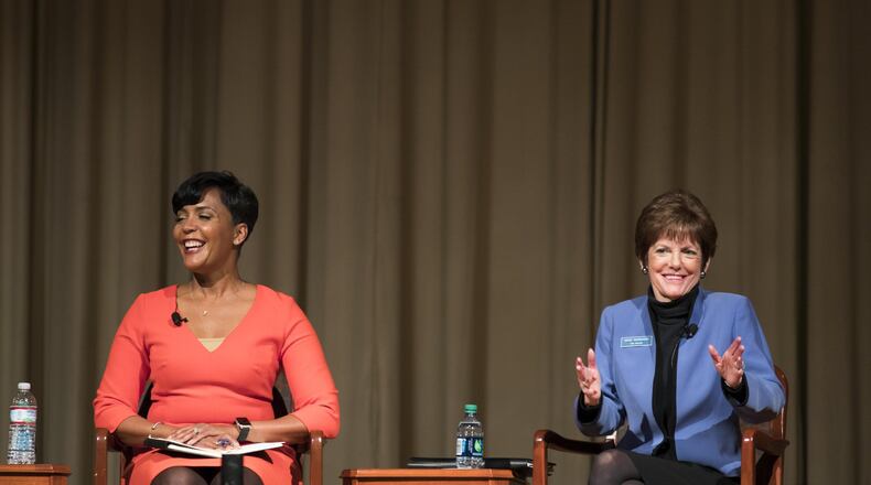 Atlanta mayoral candidates Keisha Lance Bottoms, left, and Mary Norwood participate in a forum Tuesday at the Carter Center. ALYSSA POINTER/ALYSSA.POINTER@AJC.COM