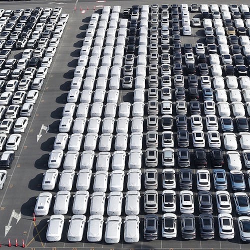 FILE - Aerial view of new cars waiting for shipment at a port in Shanghai, China, on Jan. 14, 2026. (Chinatopix via AP, File)