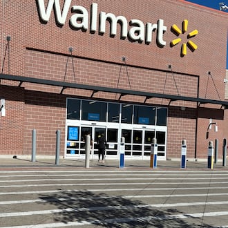 FILE - A shopper heads into a Walmart store Thursday, Oct. 16, 2025, in Englewood, Colo. (AP Photo/David Zalubowski, File)