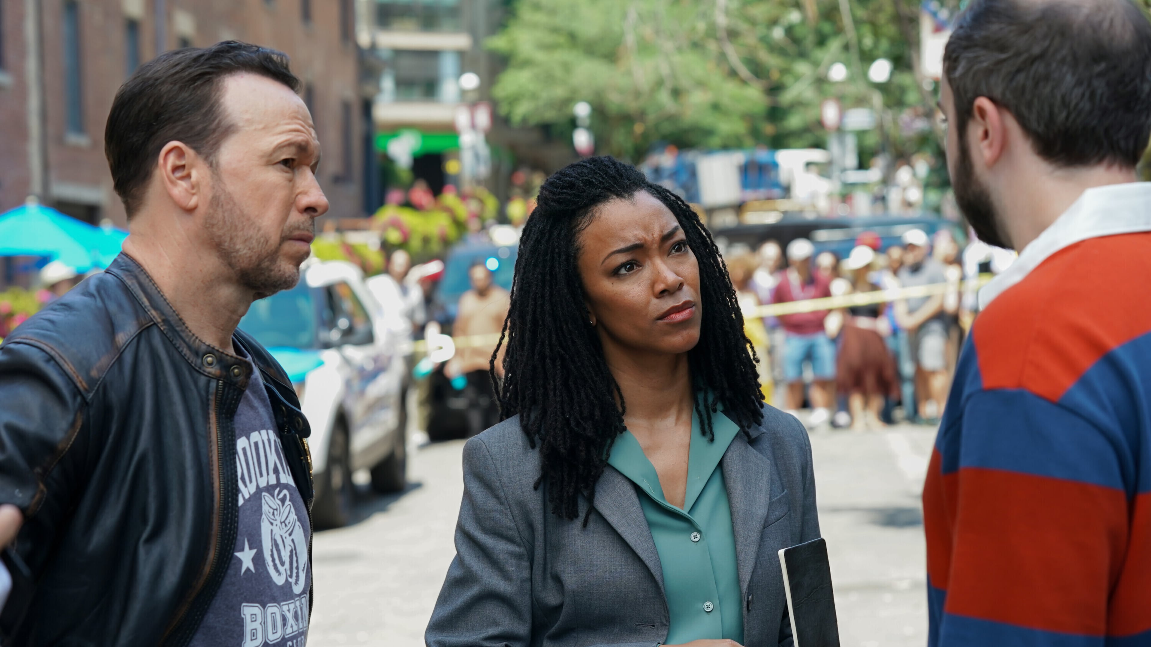 This image released by CBS shows Donnie Wahlberg, left, and Sonequa Martin-Green in a scene from "Boston Blue." (John Medland/CBS via AP)