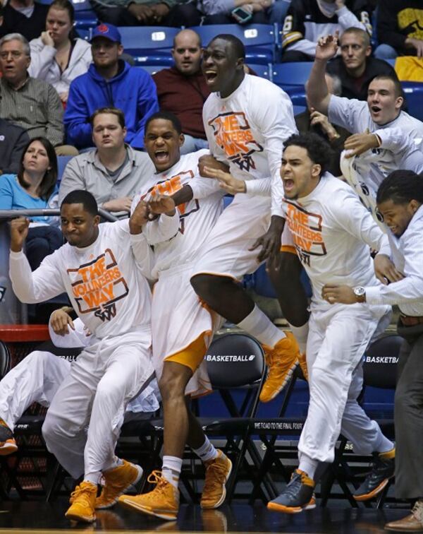 Tennessee players jump off the bench in the second half of their 78-65 win over Iowa in a first-round game of the NCAA college basketball tournament, Wednesday, March 19, 2014, in Dayton, Ohio. (AP Photo/Al Behrman) The Big Orange had a big night in Dayton. (Al Behrman/AP)