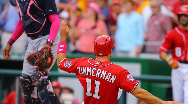 Nationals Ryan Zimmerman scores the winning run past Braves catcher Christian Bethancourt on a RBI-double Wilson Ramos in the 8th inning during a baseball game on Sunday, May 10, 2015, at Nationals Park in Washington, D.C. The Nationals beat the Braves 5-4. Curtis Compton / ccompton@ajc.com