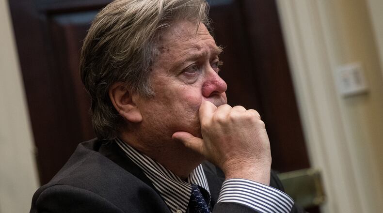 White House chief strategist Steve Bannon looks on as President Donald Trump meets with Senate and House legislators in the Roosevelt Room at the White House last week. Drew Angerer/Getty Images