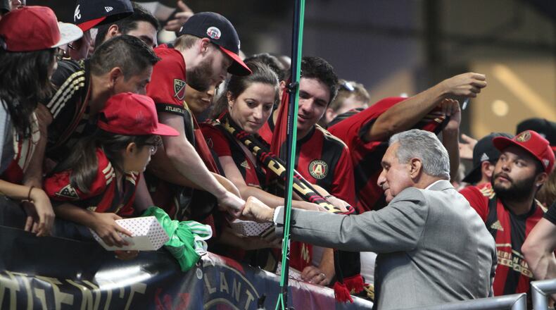 Atlanta United owner Arthur Blank Celebrates with the fans after the victory against the Philadelphia Union the team clinch one of the six playoffs spots in the Eastern Conference last season.