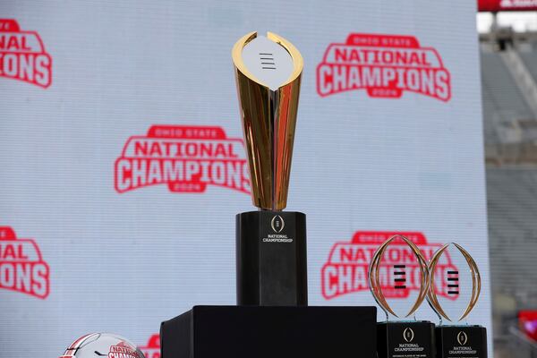 FILE - The College Football Playoff National Championship Trophy on display before the Ohio State Buckeyes National Championship celebration at Ohio Stadium in Columbus, Ohio, Sunday, Jan. 26, 2025. (AP Photo/Joe Maiorana, File)