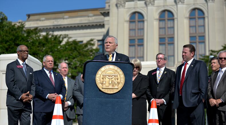 April 4, 2015 Atlanta: Gov. Nathan Deal speaks at Liberty Plaza befogging singing a $900 million transportation bill Monday April 4, 2015. BRANT SANDERLIN/BSANDERLIN@AJC.COM