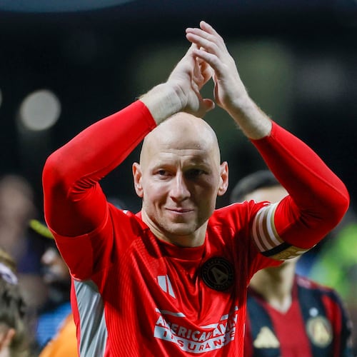 Brad Guzan applauds the supporters after the game Saturday, Oct. 18, 2025, at Mercedes-Benz Stadium in Atlanta. Brad Guzan retires from professional soccer, hanging up his gloves after a career that has lasted over two decades. (Miguel Martinez/AJC)
