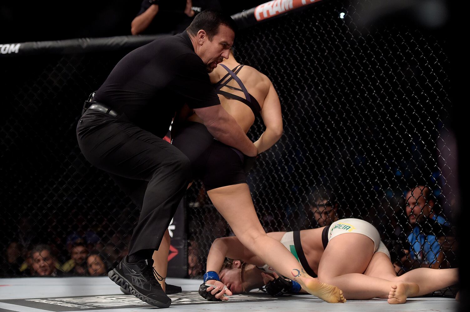 Photos: Rousey knocks out Correia in UFC title bout