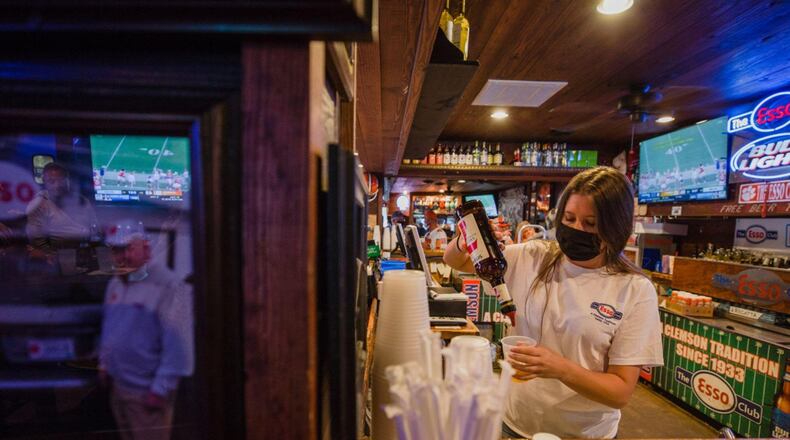 The Atlanta economy in January was still about 161,100 jobs shy of its level a year earlier, with many of the missing jobs in service industries that depend on in-person customers. (Bloomberg photo by Micah Greene).