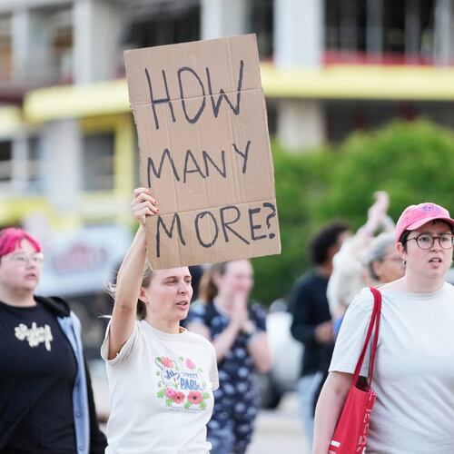 Protesters march after a Madison police officer shot and killed a man Wednesday, July 22, 2026, in Madison, Wis. (AP Photo/Kayla Wolf)
