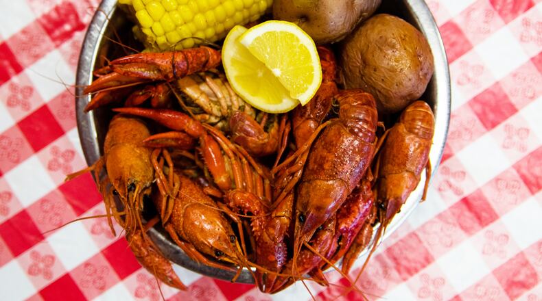 Steamed crawfish scented with lemongrass at Crawfish Shack on Buford Highway. CONTRIBUTED BY HENRI HOLLIS