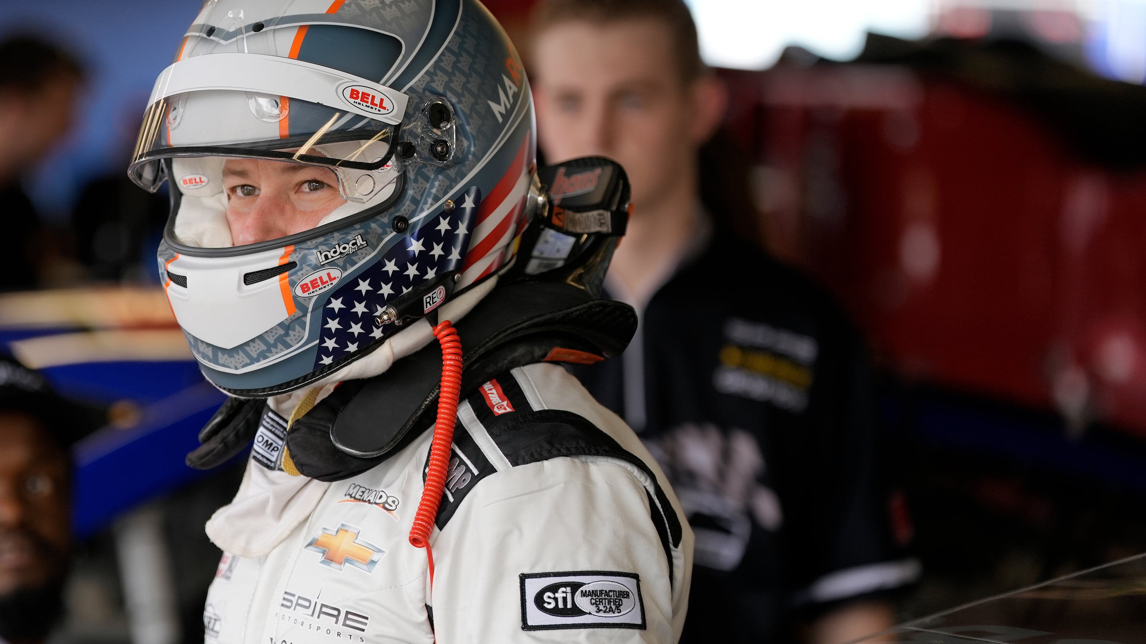 FILE - ARCA driver Marco Andretti looks out of the garage before a practice run for an ARCA Mendards Series auto race Thursday, Feb. 15, 2024, at Daytona International Speedway in Daytona Beach, Fla. (AP Photo/Chris O'Meara, file)