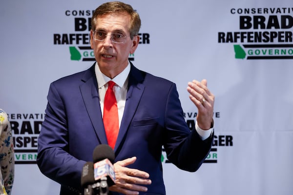 Secretary of State Brad Raffensperger speaks to supporters after falling short during the Republican primary for governor last month. (Miguel Martinez/AJC)