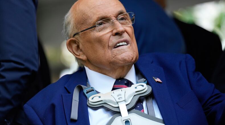 FILE - Former NYC mayor Rudy Giuliani participates in a ceremony commemorating the anniversary of the 9-11 terror attacks in New York, Thursday, Sept. 11, 2025. (AP Photo/Seth Wenig,File)