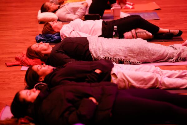 There is no wrong way to experience a sound bath, and that inclusivity is part of what’s driving its popularity beyond traditional wellness spaces. (Arvin Temkar/AJC)